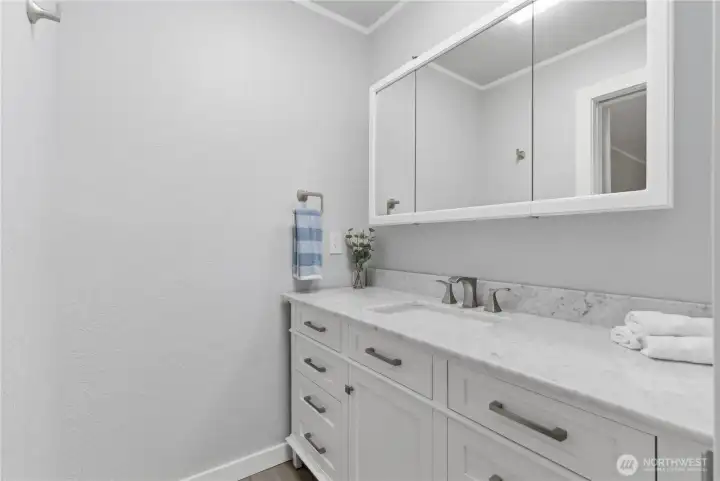 Separate vanity with marble countertops