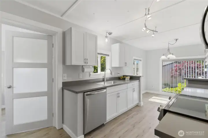 Conveniently located laundry/mudroom with W/D hookups and storage