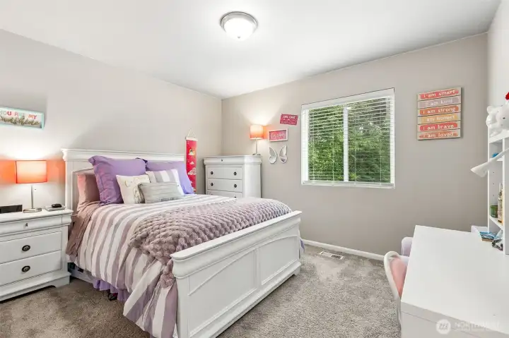 4th bedroom also spacious and overlooks the yard with a territorial view 4th bedroom also spacious and overlooks the yard with a territorial view
