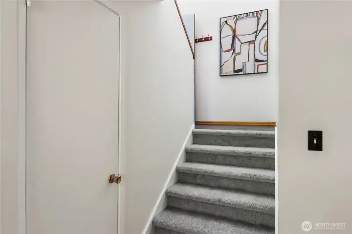 Stairs leading to downstairs dining room and kitchen. Stairs leading to downstairs dining room and kitchen.