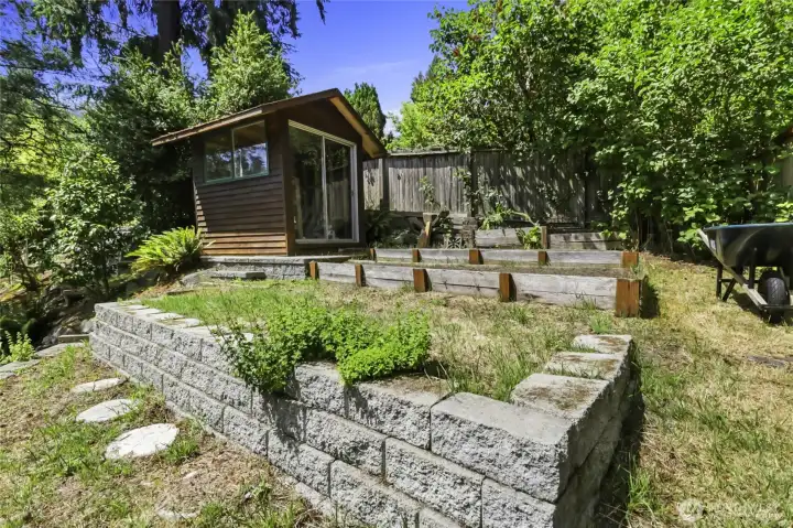 Terraced walls create raised garden beds. Terraced walls create raised garden beds.