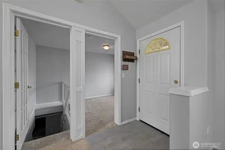 Entry, Den & Stairs to full basement Entry, Den & Stairs to full basement