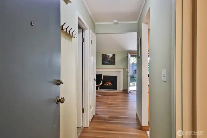 Freshly painted and tastefully updated. Full bath via the first door on your right, with the entry to the kitchen just beyond this door (also to the right). Main level bedroom is the first door on your left.