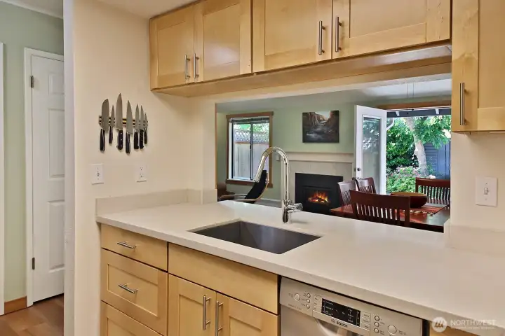 Pass through to the dining area. This condo has plenty of light.