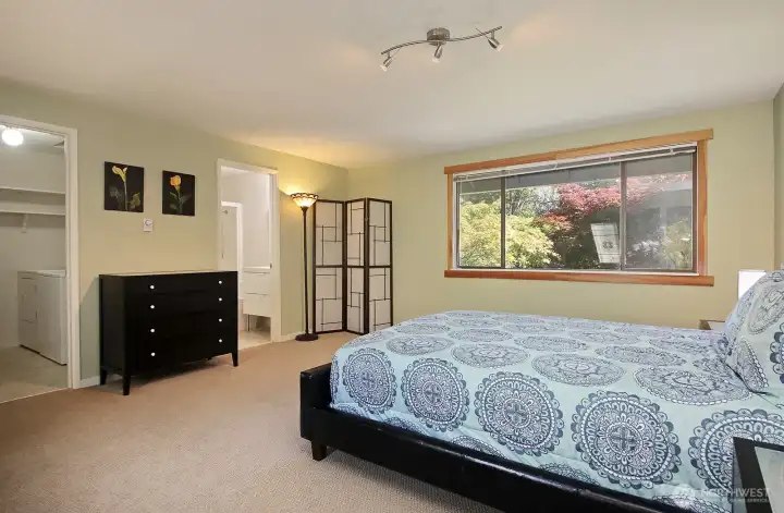 Door to the left is the walk in closet, door to the right is the full bath.