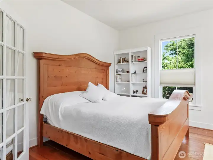 Main floor office/den used as primary bedroom.