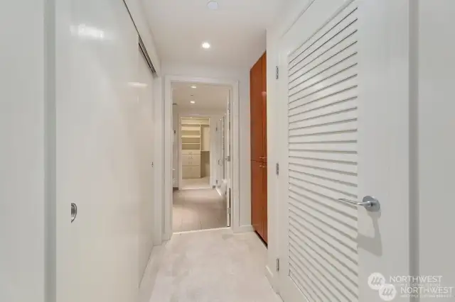 Bedroom to Main bath walkway with enormous storage space