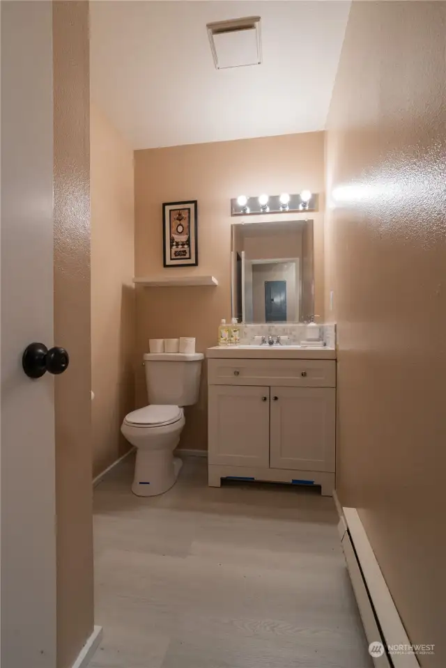Guest Bathroom in the main floor with new vanity & new Toilet.