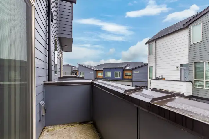 There is a balcony deck, with a gas outlet for a barbecue-no propane tanks needed!  The deck's slight slant ensures efficient draining in wet weather