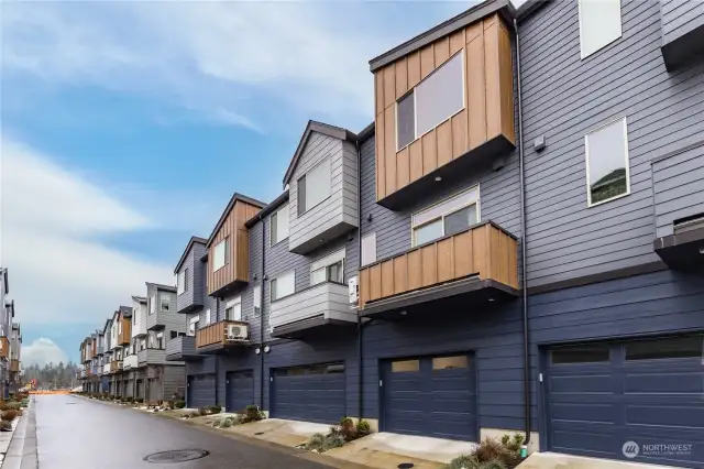 Another view of the wide ally that services the townhomes' garages