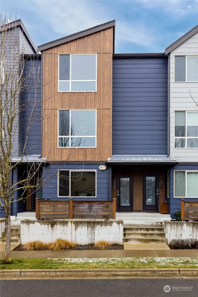 The front of the townhome; the first floor is the garage, then the main floor, with bedrooms on the upper floor