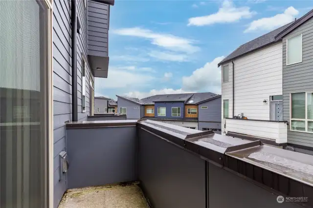 There is a balcony deck, with a gas outlet for a barbecue-no propane tanks needed!  The deck's slight slant ensures efficient draining in wet weather