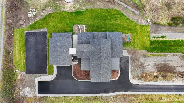 Upper view, including sport court, extra parking space, etc.