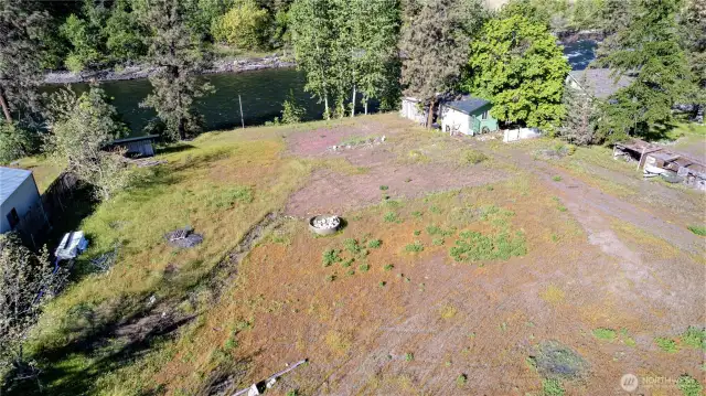 Level building site has easy access from both sides off a county maintained, dead end road.