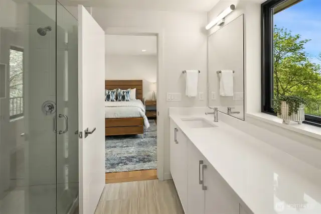 En-suite functions as a jack and jill to the hallway.