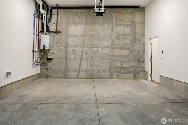 Garage photo is from Model Unit at Lot 8 (298 118th Ave SE) at the same project.  Height of ceiling will vary.