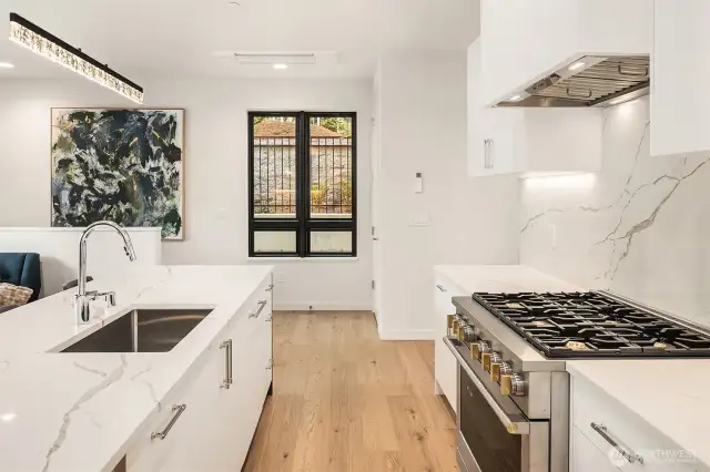 Interior photos are from the Model Unit at Lot 8 (298 118th Ave SE) at the same project.  Floorplan and features are the same, but the color scheme and finishes will vary.
