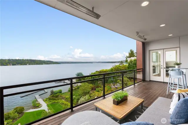 Covered and heated outdoor deck off of the kitchen and main level living areas.