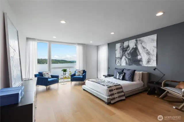 Primary bedroom suite with lake views.