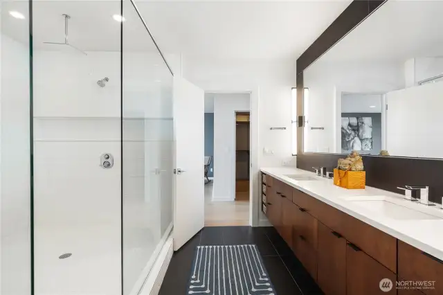 Primary bathroom, dual showers and ample storage