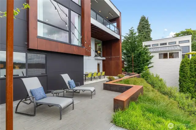 Large, lower outdoor dining area + Lounges