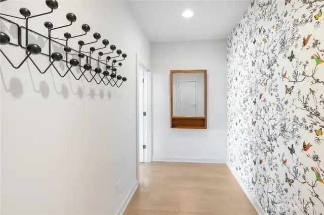 Mudroom and storage between garage and main level.