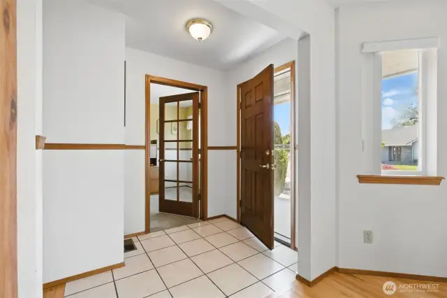 Entryway, facing home office/spare bedroom