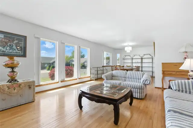 Living room with dining area in rear of picture
