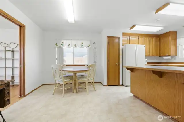 Kitchen featuring casual eating area