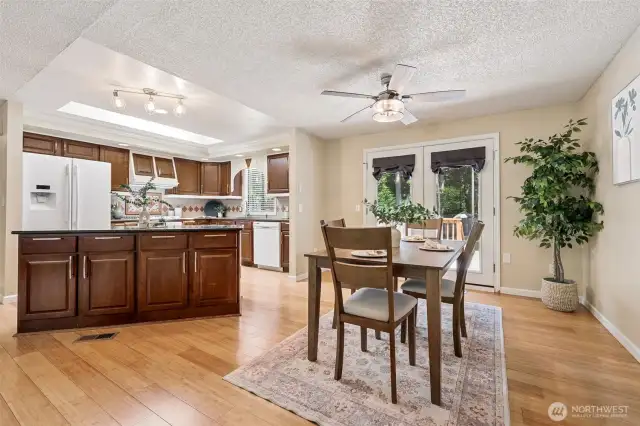 French doors off the dining area lead to the large deck.