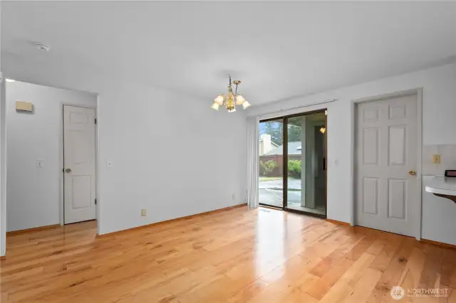 Dining space with door to fenced backyard