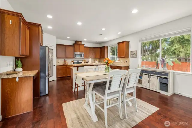 Large eat-in kitchen! With both a bar counter and plenty of room for a table, this kitchen space has it all!