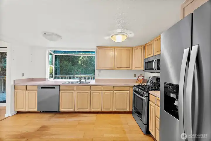 Good size Kitchen w/ eating area. Stainless steel appliances stay!