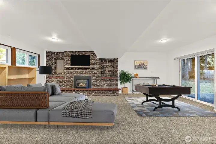 Downstairs bonus room. Virtually staged.