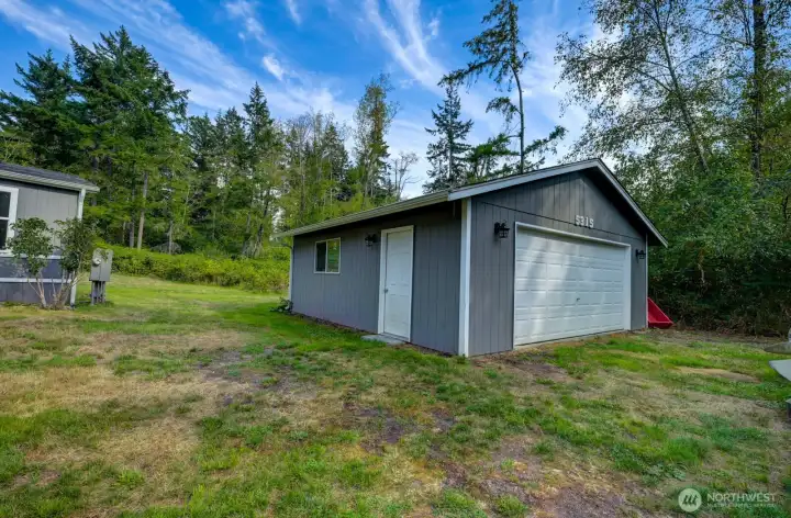 Detached Garage/Shop 24'x24' - use as a 1-car garage or turn into a workshop for whatever your hobby may be. Side entrance door plus window.