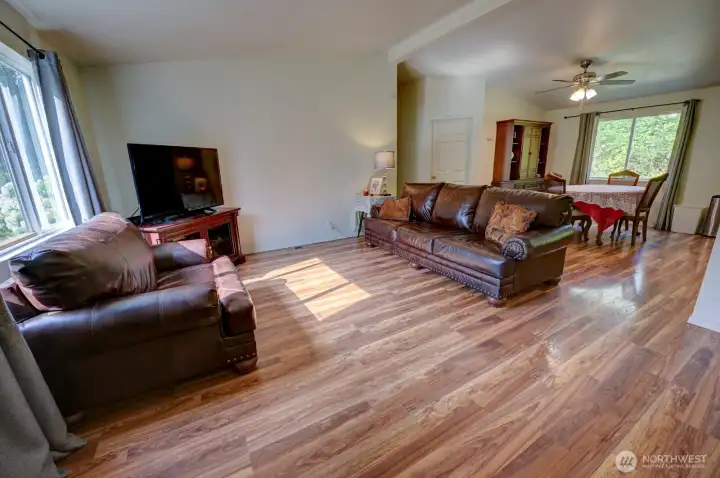 Living room looking to dining room from front entry.
