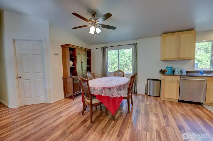 Dining room with open floor plan to kitchen and living room