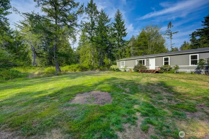 Views of front yard looking to side territorial view