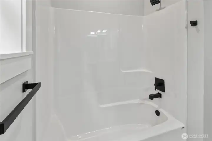 Guest bath with fresh, modern fixtures – looks great and works well!