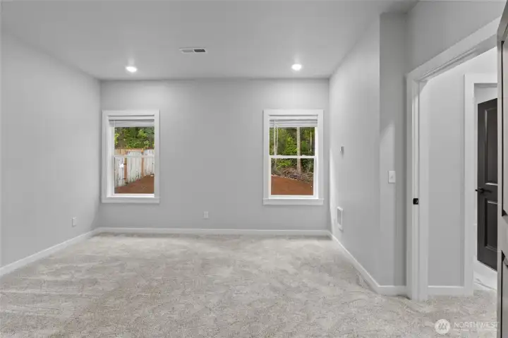 Main Bedroom featuring ample natural light.