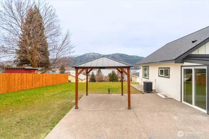 The outdoor space features a concrete patio and gazebo, already wired for a hot tub or grill—perfect for entertaining. Relax and soak in the sunrises, sunsets, and long summer days while enjoying breathtaking views of the valley.