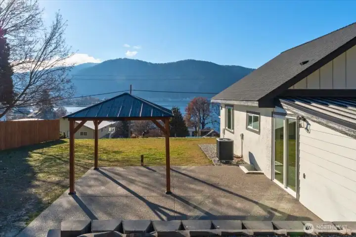 The outdoor space features a concrete patio and gazebo, already wired for a hot tub or grill—perfect for entertaining. Relax and soak in the sunrises, sunsets, and long summer days while enjoying breathtaking views of the valley.