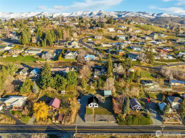 Located in the beautiful town of Manson, this home sits on an impressive lot with a spacious yard. Zoning may allow for an ADU if desired—buyer to verify.
