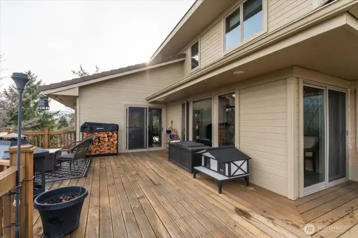 Deck accessed off the main floor living room and primary bedroom