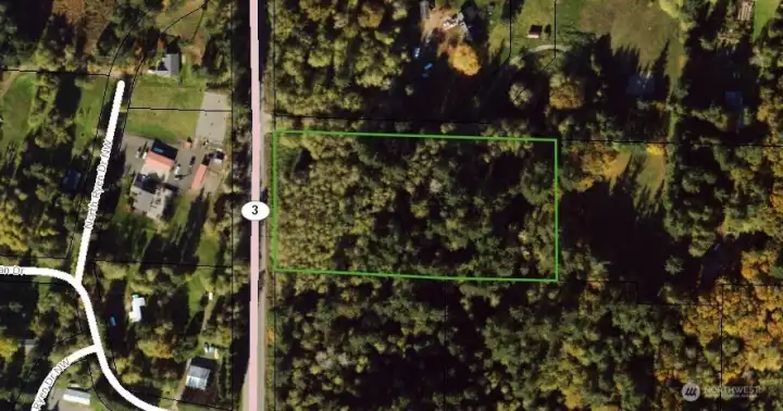 Park near the nw corner and walk down the driveway on the north side.