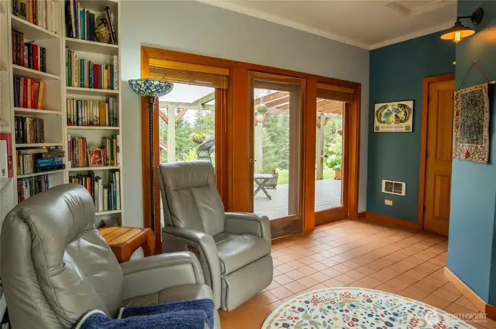 Main house floor 1 office/den with doors to west-facing deck