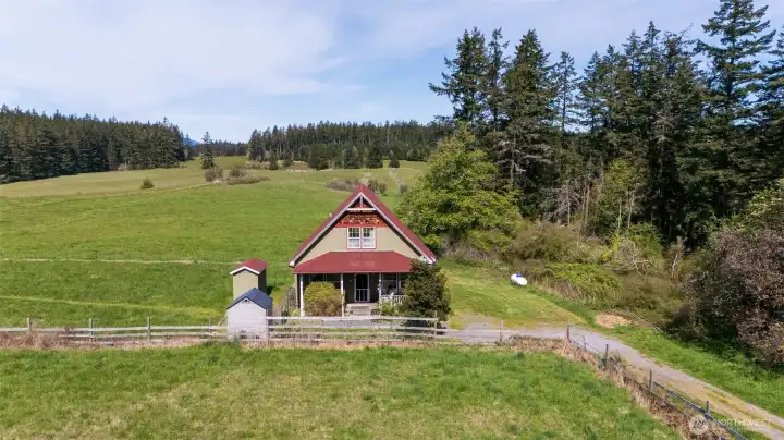 Guesthouse, seen looking north over pastures and forest of the 20 acre parcel