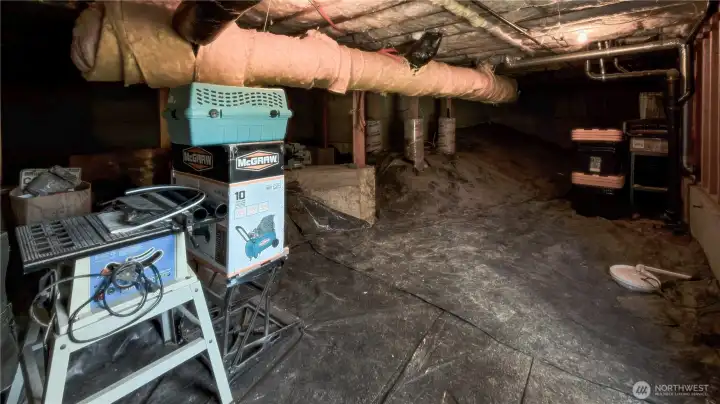 Crawl space with lot's of storage and Sump-pump