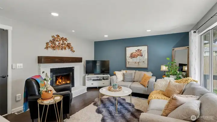 Spend nights snuggled up around this cozy wood burning fireplace.