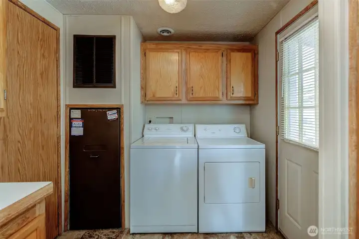 Laundry Rm. with storage.